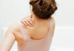 Do bigger breasts cause more back pain?